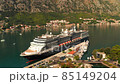 Wonderful view of the city of Kotor and the docked cruise ship in the port, Montenegro. 85149204