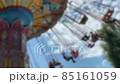 Large Colourful Carousel at the park on blue sky background. Blurred view. 4K 85161059