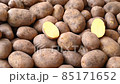 Potatoes for sale at vegetable market, close up. Boxes full of potatoes in shop. Fresh potato at the greengrocer's stall.   85171652
