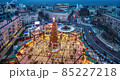 People enjoy the view of the New Year tree 2022 on Sophia Square, Kyiv, Ukraine. Time lapse 85227218
