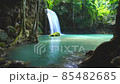 Waterfalls and fish swim in the emerald blue water in Erawan National Park. Erawan Waterfall is a beautiful natural rock waterfall in Kanchanaburi, Thailand.Onsen atmosphere. Fresh nature.4K 85482685