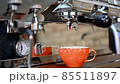Anonymous barista brewing coffee in cafe 85511897