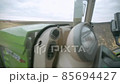 Harvesting in the field. Land cultivation with a tractor 85694427