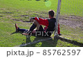Football Goalkeeper Having Rest Sitting by the 85762597