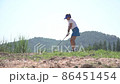 People lifestyle asia woman playing game golf and hitting go on green grass and mountain background. Asian female player game shot in summer. 86451454