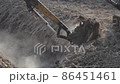 Loader backhoe, excavator digging a trench. Clip. Work of excavating machine on building construction site. Excavator digs a hole 86451461