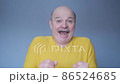 Senior caucasian man scared and amazed with open mouth for surprise 86524685