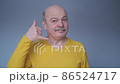 Senior hispanic man show sight call me with fingers 86524717
