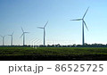 Wind turbines on blue sky background 86525725
