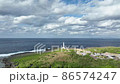 A drone shot of Cape Zanpa, a scenic light spot in Yomitan Village, Okinawa Prefecture, from the sky 86574247
