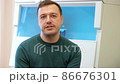 Chemistry lab researcher man talking look camera biomedical laboratory. 86676301