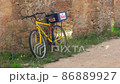 Bicycle leaning against Obidos Suidobashi 86889927