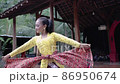 Javanese dancer showing her dancing pose 86950674