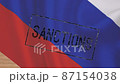 Hand putting stamp sanctions on Russian national flag 87154038