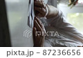 Senior Woman checks documents 87236656