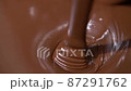 Close-up stirring chocolate, hot melted liquid chocolate. 87291762