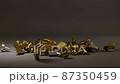 3D animation. The mettalic dumbbell falls to the floor and breaks into small pieces 87350459