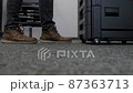 Technician sets up a multi-function copier device. 87363713