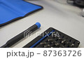 Bit screwdriver set prepared for use on a blue mat 87363726