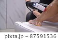 Laser epilation - hair removal procedure. Slider shooting 87591536