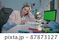 Female designer draws, crumples the paper, and throws it away 87873127