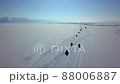 An expedition of atv riders travels along Lake Baikal. Shooting from a drone 88006887