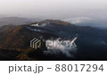 Troodos mountain landscape with low clouds at sunset 88017294