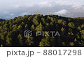 View from mountainside to highland valley within low clouds 88017298