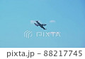 Tracking shot of an airplane flying on the sky at acrobatic airshow demonstration competition 88217745