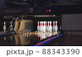 Bowling ball knocks down pins. Media. Bowling ball on the track in order to knock down the pins 88343390