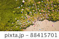 People taking sun baths at Lake Dontso in Leningrad region, Saint Petersburg Russia, aerial footage 88415701