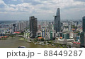4K footage of Ho Chi Minh city aerial cityscape view with tall buildings and riverbank  88449287