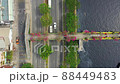 Aerial top view of morning traffic on highway and beautiful flower bridge in Ho Chi Minh city, Vietnam 88449483