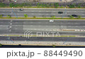 Aerial directly top view video of urban traffic on freeway  88449490