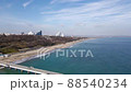 Aerial movie, seascape of the Burgas bay, sea garden, and city. Blue sky with clouds and the Black Sea coast, Bulgaria 88540234