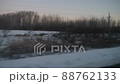 View from the train window on the evening winter landscape 88762133