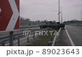 wrecked tank on the highway. war in Ukraine 89023643