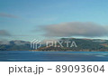 Cloudscape Over A River And Hill. 89093604