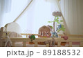 baby woke up and looks out of crib 89188532
