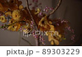 Yellow and red, flower works woven by branches 89303229