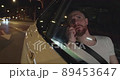 Taxi passenger Serious coversation over the phone from the back seat in the night 89453647