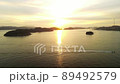 一月中旬、岡山県玉野市宇野より空撮した船と波をアクセントにした朝焼け 89492579