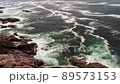 Waves Crashing On Rocks. 89573153