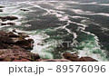 Waves Crashing Onto Rocks. 89576096