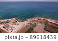 drone 4k aerial footage protaras cyprus sea holiday resort ocean turquoise coast beach vacation 89618439