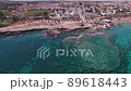 drone 4k aerial footage protaras cyprus sea holiday resort ocean turquoise coast beach vacation 89618443