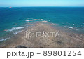 Remote island lighthouse drone 89801254