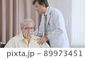 Asian senior patient having medical exam with doctor in hospital 89973451