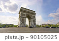 Paris, France, Timelapse - The Arc de Triomphe and the city traffic on the Champs-Elysees during a sunny day 90105025