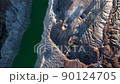 Excavator load limestone in mining truck in open pit mine. Haul truck transports chalk and clay  90124705